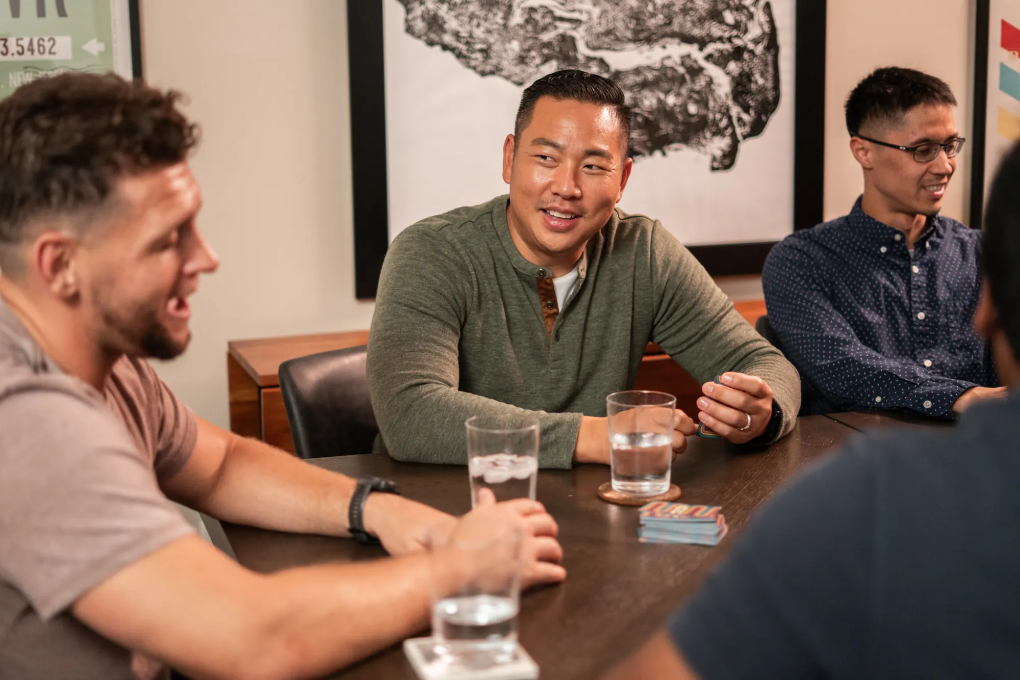 Men in conversation at a Dinner Group
